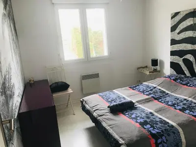 Un ou plusieurs lits dans un hébergement de l'établissement Villa Baïne 8p seignosse