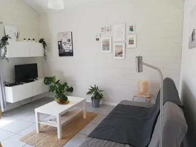 Télévision ou salle de divertissement dans l'établissement Appartement proche lac et plage