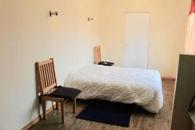 Un ou plusieurs lits dans un hébergement de l'établissement Grande Maison Familiale entre lac et océan