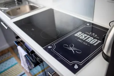 Cuisine ou kitchenette dans l'établissement T2 3 étoiles de charme 40 m2 centre ville Dax