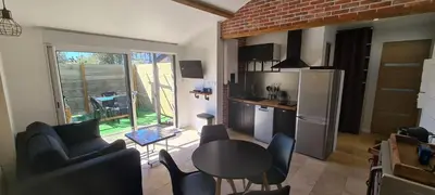 Cuisine ou kitchenette dans l'établissement Appartement Ychoux