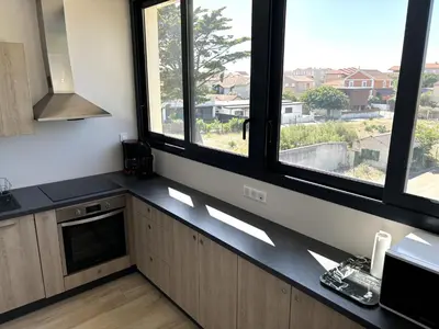 Cuisine ou kitchenette dans l'établissement Les terrasses de l'océan A11
