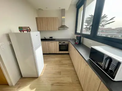 Cuisine ou kitchenette dans l'établissement Les terrasses de l'océan A11