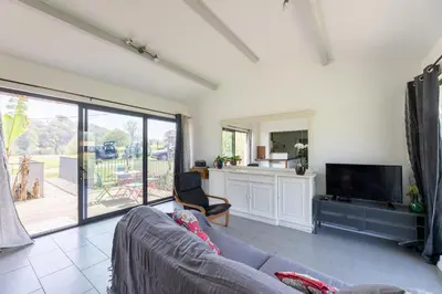 Télévision ou salle de divertissement dans l'établissement Gîte Le Moulin Pocheluberry