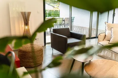 Coin salon dans l'établissement Villa confortable à Seignosse avec piscine privée