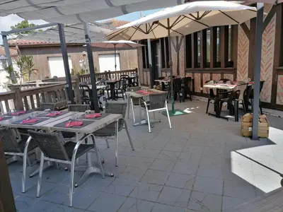 Restaurant ou autre lieu de restauration dans l'établissement Le Fair Play