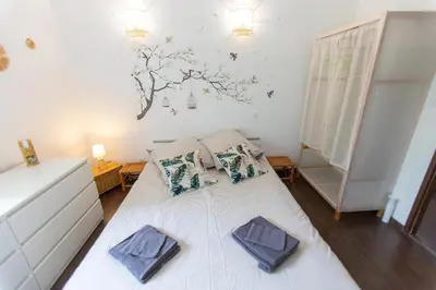 Un ou plusieurs lits dans un hébergement de l'établissement La Villa Minvia les Landes entre mer et montagne