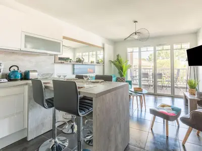 Cuisine ou kitchenette dans l'établissement Apartment Les Portes de Pyla by Interhome