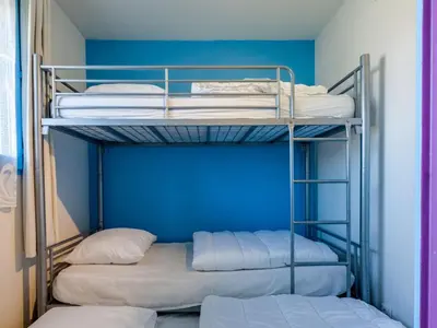 Un ou plusieurs lits dans un hébergement de l'établissement Apartment Maison de l'océan-6 by Interhome
