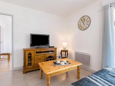 Télévision ou salle de divertissement dans l'établissement Holiday Home Côté du Lac by Interhome