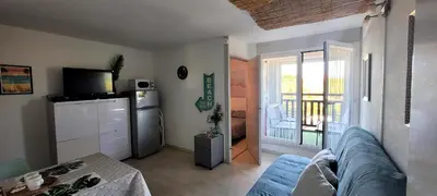 Cuisine ou kitchenette dans l'établissement Palm Appart