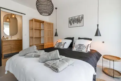 Un ou plusieurs lits dans un hébergement de l'établissement Maison Gemme a Landes