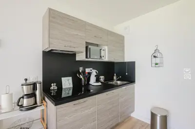 Cuisine ou kitchenette dans l'établissement Ondine