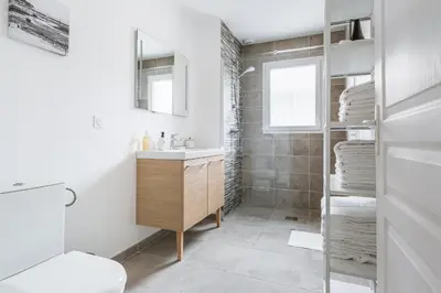 Salle de bains dans l'établissement Le Capbreton