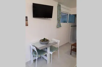 Télévision ou salle de divertissement dans l'établissement studio idéalement situé sur le Bassin d'Arcachon