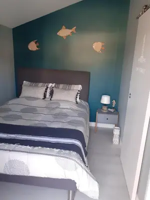 Un ou plusieurs lits dans un hébergement de l'établissement Chalet tout équipé, terrasse