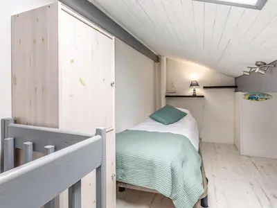 Un ou plusieurs lits dans un hébergement de l'établissement Holiday Home Paradise Océan-13 by Interhome