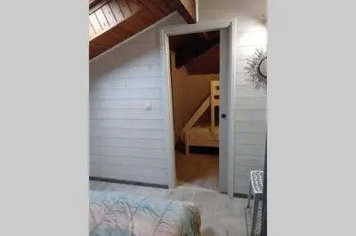 Un ou plusieurs lits dans un hébergement de l'établissement Appartement tout confort proche plage