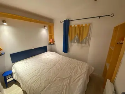 Un ou plusieurs lits dans un hébergement de l'établissement Mobilehome 3 chambres curistes camping piscine