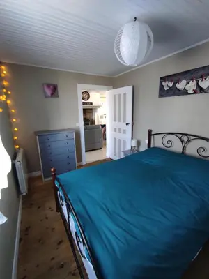 Un ou plusieurs lits dans un hébergement de l'établissement Maison Landaise chaleureuse