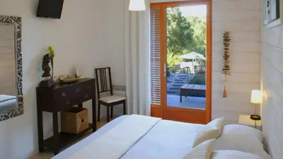 Un ou plusieurs lits dans un hébergement de l'établissement Ohana Lodge