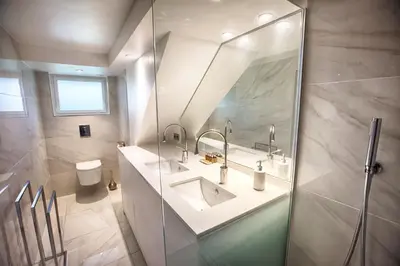 Salle de bains dans l'établissement APPARTEMENTS LOFT OCEAN - Tarnos