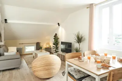 Coin salon dans l'établissement Belle location proche de Dax avec parking et toute commodité