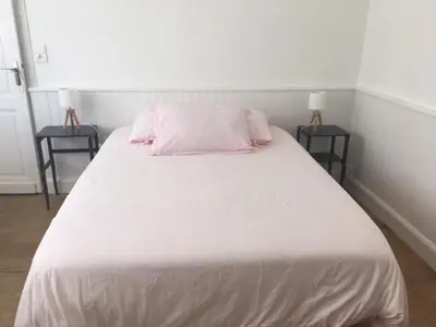 Un ou plusieurs lits dans un hébergement de l'établissement Mimizan Plage Grande maison bord de mer