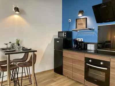 Cuisine ou kitchenette dans l'établissement Les Halles 2 - Central - Lumineux - Spacieux - Fibre