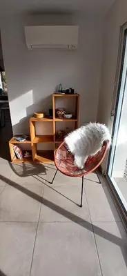 Coin salon dans l'établissement Maison Solyselva Piscine- Proche océan- Climatisée