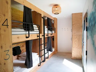 Un ou plusieurs lits superposés dans un hébergement de l'établissement HEJMO Hostel