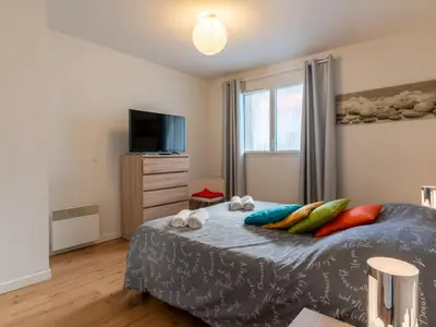 Un ou plusieurs lits dans un hébergement de l'établissement Appartement T2 avec piscine, proche océan, linge et ménage inclus, à Biscarrosse Plage - FR-1-319-455