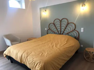 Un ou plusieurs lits dans un hébergement de l'établissement Chambres d’hôtes Arremounon