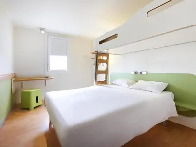 Un ou plusieurs lits dans un hébergement de l'établissement ibis budget Saint Paul Les Dax