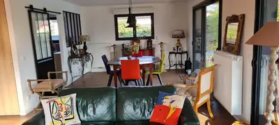 Coin salon dans l'établissement VILLA LES COQUELICOTS