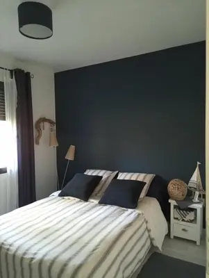 Un ou plusieurs lits dans un hébergement de l'établissement Maison neuve et chaleureuse