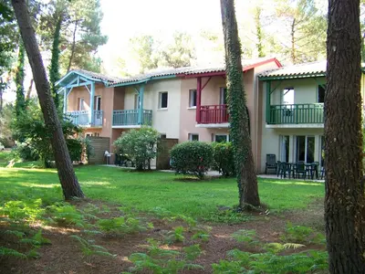 Jardin de l'établissement Bel appartement lumineux à Vieux Boucau avec piscine chauffée - Résidence Domaine du Golf de Pinsolle