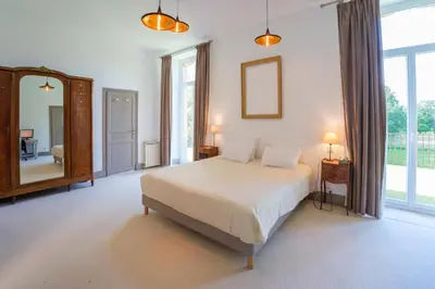 Un ou plusieurs lits dans un hébergement de l'établissement Château de Larunque, 15 p, piscine spa tennis - plages 30 mn