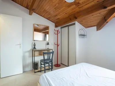 Un ou plusieurs lits dans un hébergement de l'établissement Appartement T3 Bord de plage