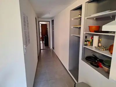 Cuisine ou kitchenette dans l'établissement Agréable Studio tout équipé