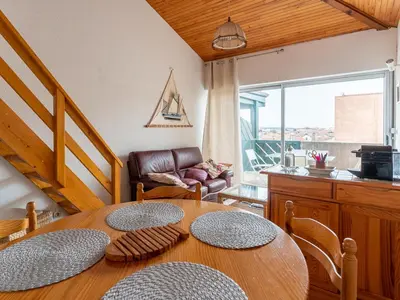 Coin salon dans l'établissement Mimizan Plage: Appartement T2 Mezzanine 2 étoiles, 4 pers, vue océan, parking inclus - FR-1-50-86