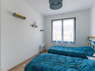 Un ou plusieurs lits dans un hébergement de l'établissement Maison neuve proche océan à Mimizan, 4 pers, clim, WIFI, jardinet, pistes cyclables, ménage inclus - FR-1-50-91