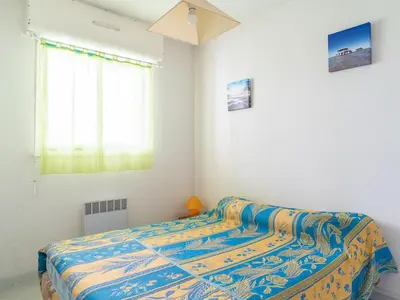 Un ou plusieurs lits dans un hébergement de l'établissement Appartement 2 étoiles à Mimizan Plage pour 4 personnes avec parking - FR-1-50-85