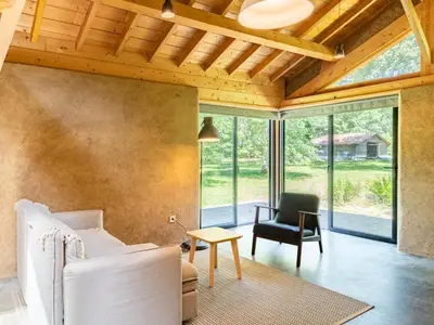 Un ou plusieurs lits dans un hébergement de l'établissement Holiday Home La Grange du Belon by Interhome