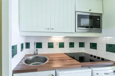 Cuisine ou kitchenette dans l'établissement Le Domaine du Golf de Pinsolle - maeva Home - Appartement 2 pièces 5 personnes - Confort MAE-2674