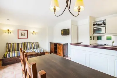 Cuisine ou kitchenette dans l'établissement Le Domaine du Golf de Pinsolle - maeva Home - Appartement 2 pièces 6 personnes - Confort MAE-9354