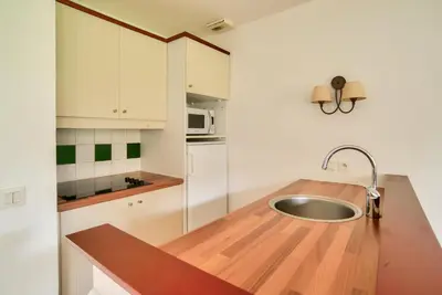 Cuisine ou kitchenette dans l'établissement Les Maisons du Domaine du Golf de Pinsolle - maeva Home - Maison 3 pièces 6 personnes - Sélection MAE-9804
