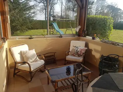 Coin salon dans l'établissement Grande maison familiale