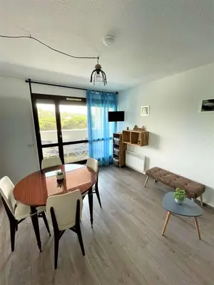 Coin salon dans l'établissement Réf 560 Seignosse océan, appartement classé 1 étoile proche plage et commerces, famille