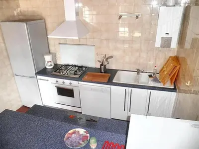 Cuisine ou kitchenette dans l'établissement Maison accueillante à Vielle-Saint-Girons avec jardin et cheminée
